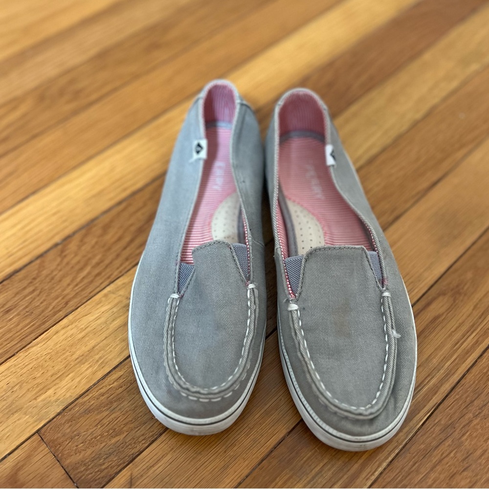 Woman, Sperry loafers.